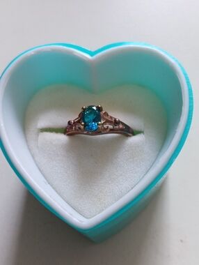 Avon Sterling Silver Adjustable Simulated Blue Zircon Ring